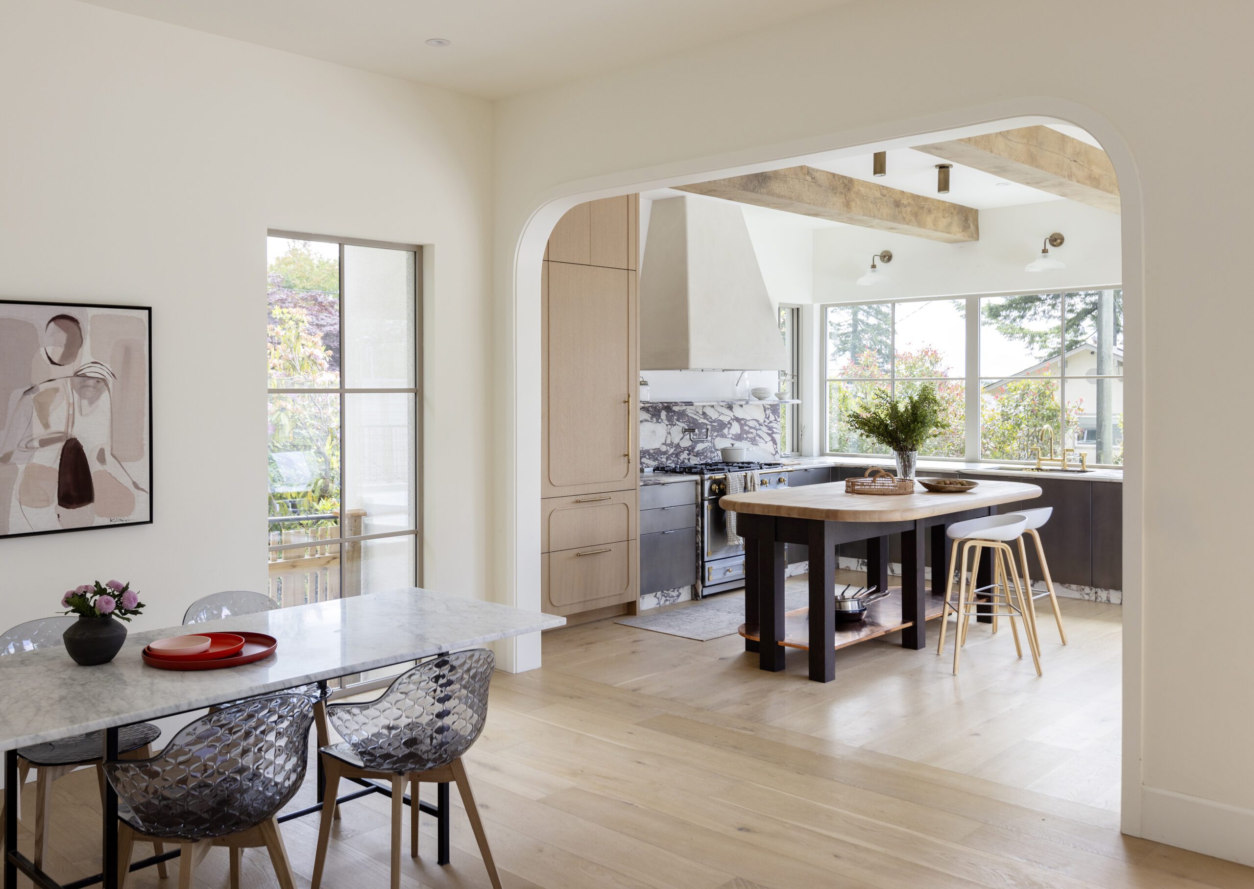 Custom kitchen and dining room at La Maison custom home built by Hasler Homes