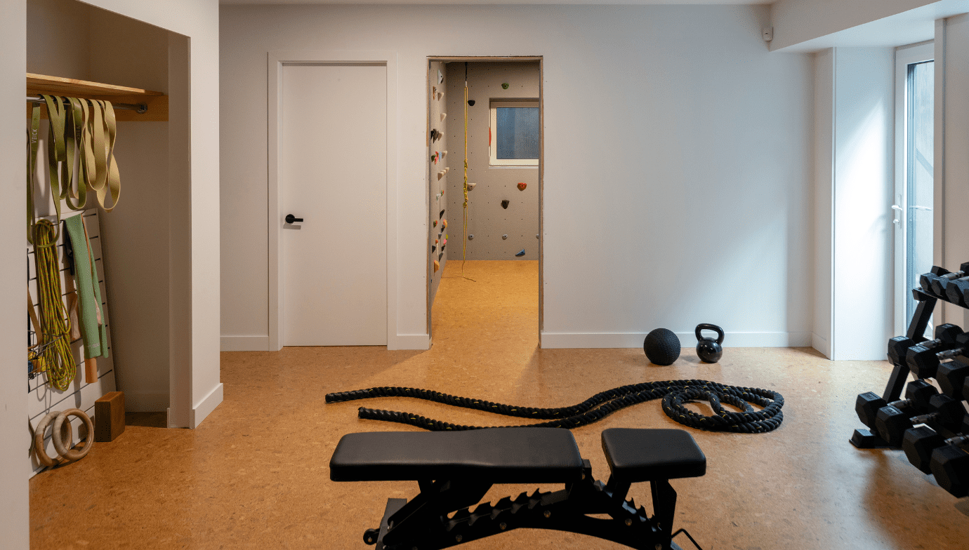 Gym and climbing wall inside North Vancouver modern rancher - Valleyhouse home