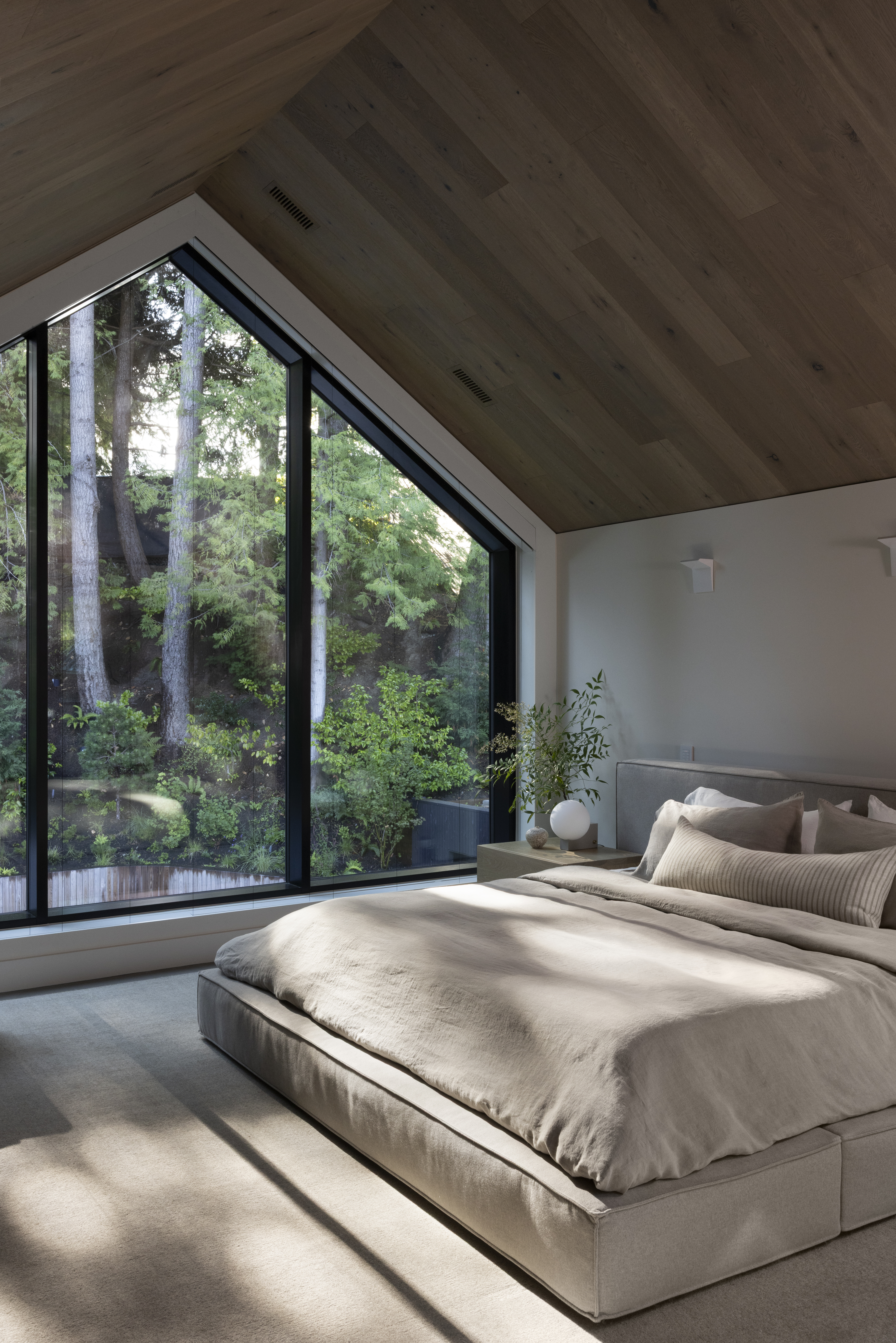 Feature window in Japandia primary bedroom