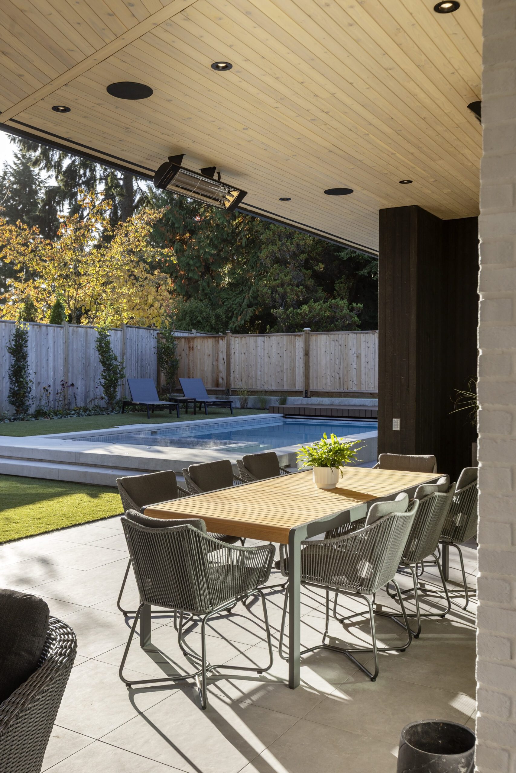 Haven (Net Zero Lifestyle) backyard dining area and pool