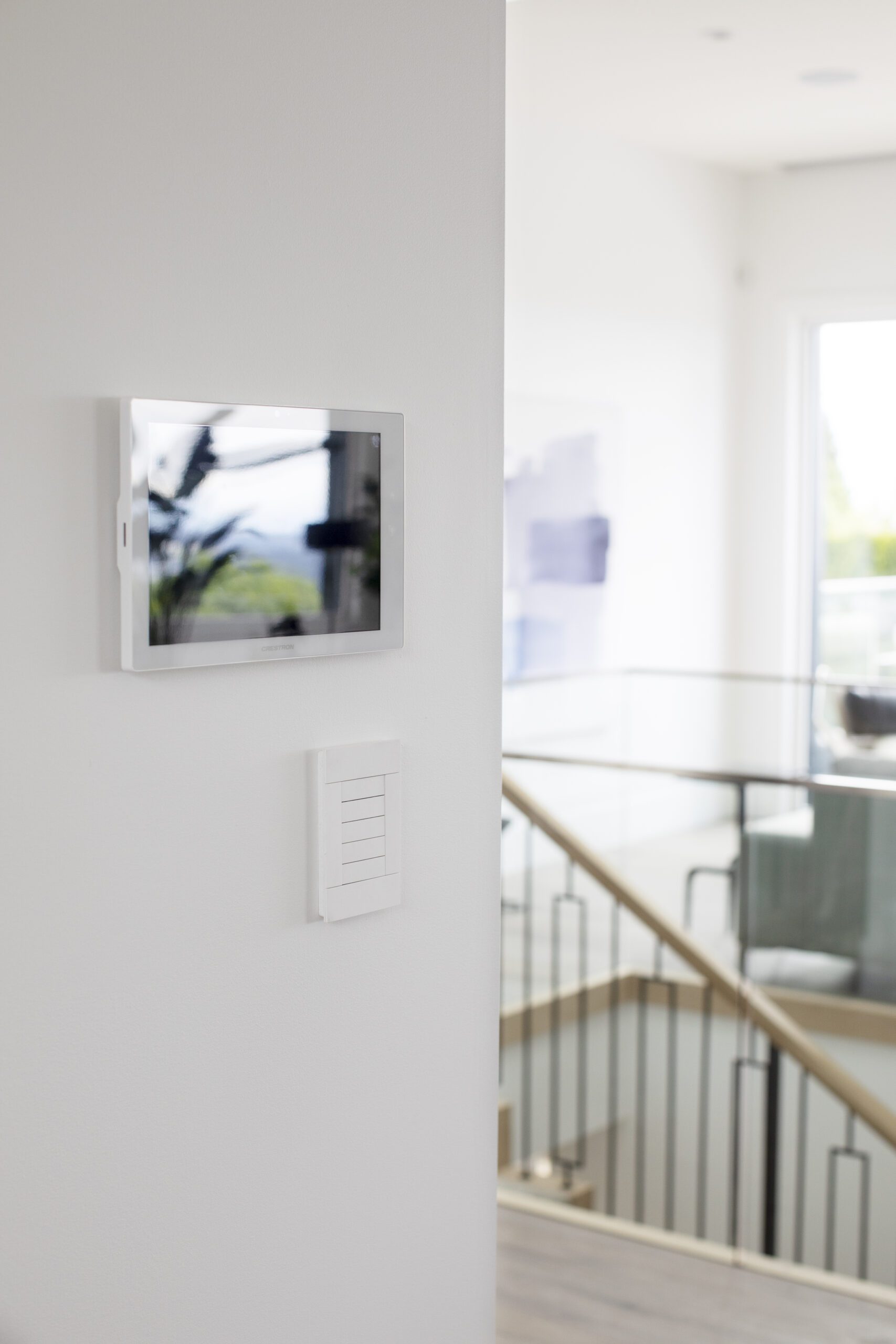 Smart home control screen on the wall at Linda Vista custom home