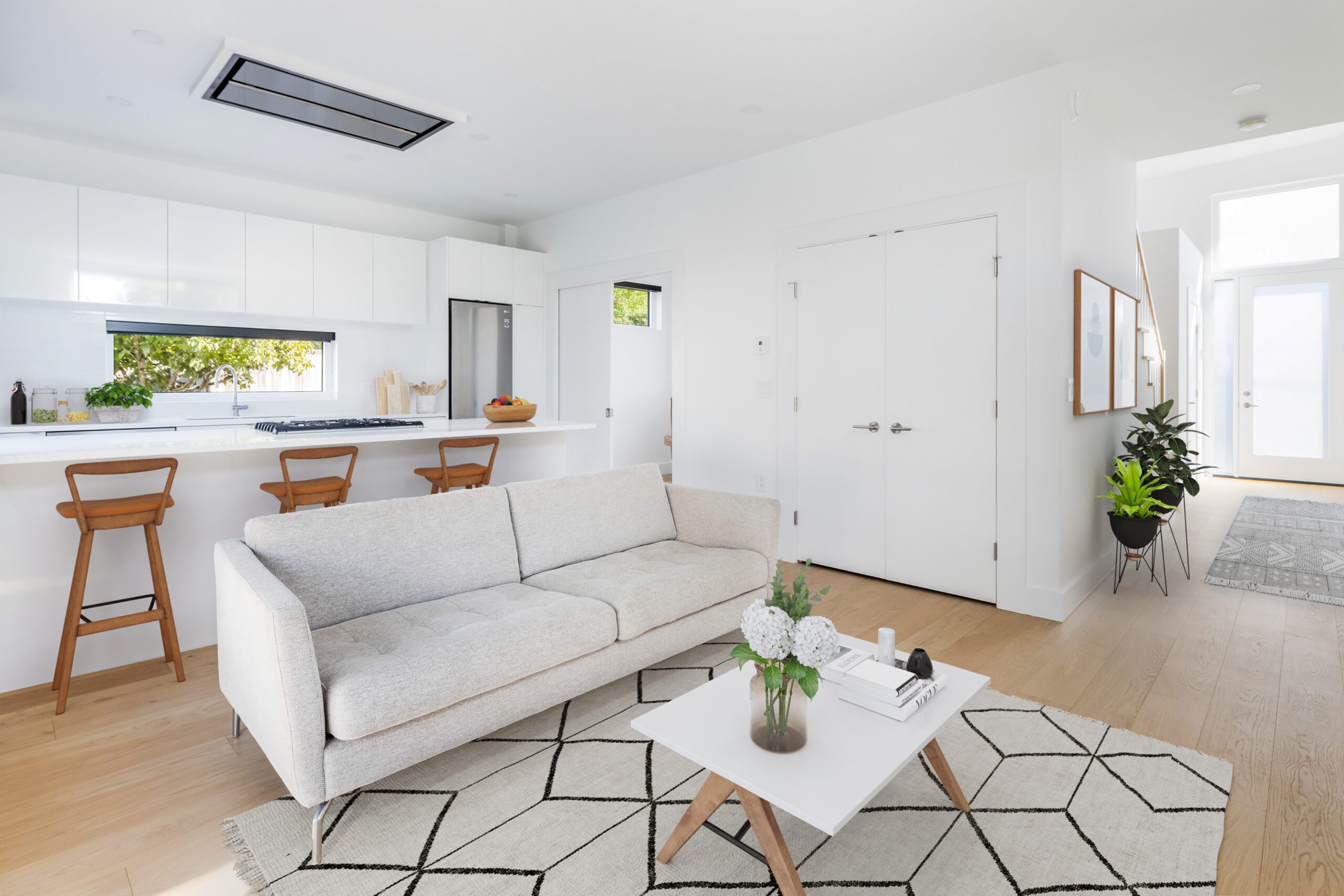 ModCo multi-generational home carriage house interior living room and kitchen