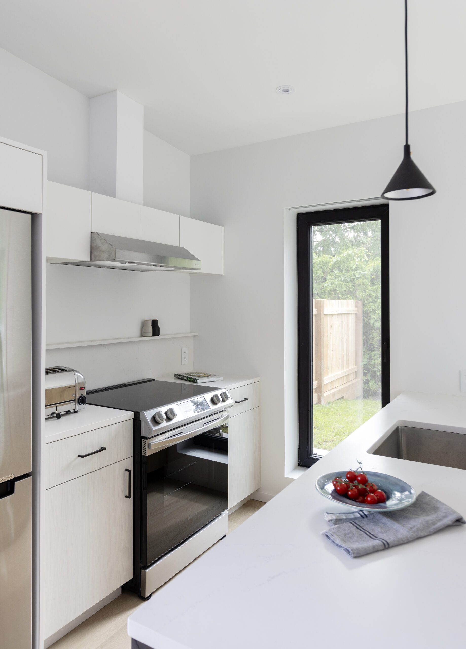 Coach house kitchen at Valleyhouse multi-generational home built by Hasler Homes in Lynn Valley, North Vancouver