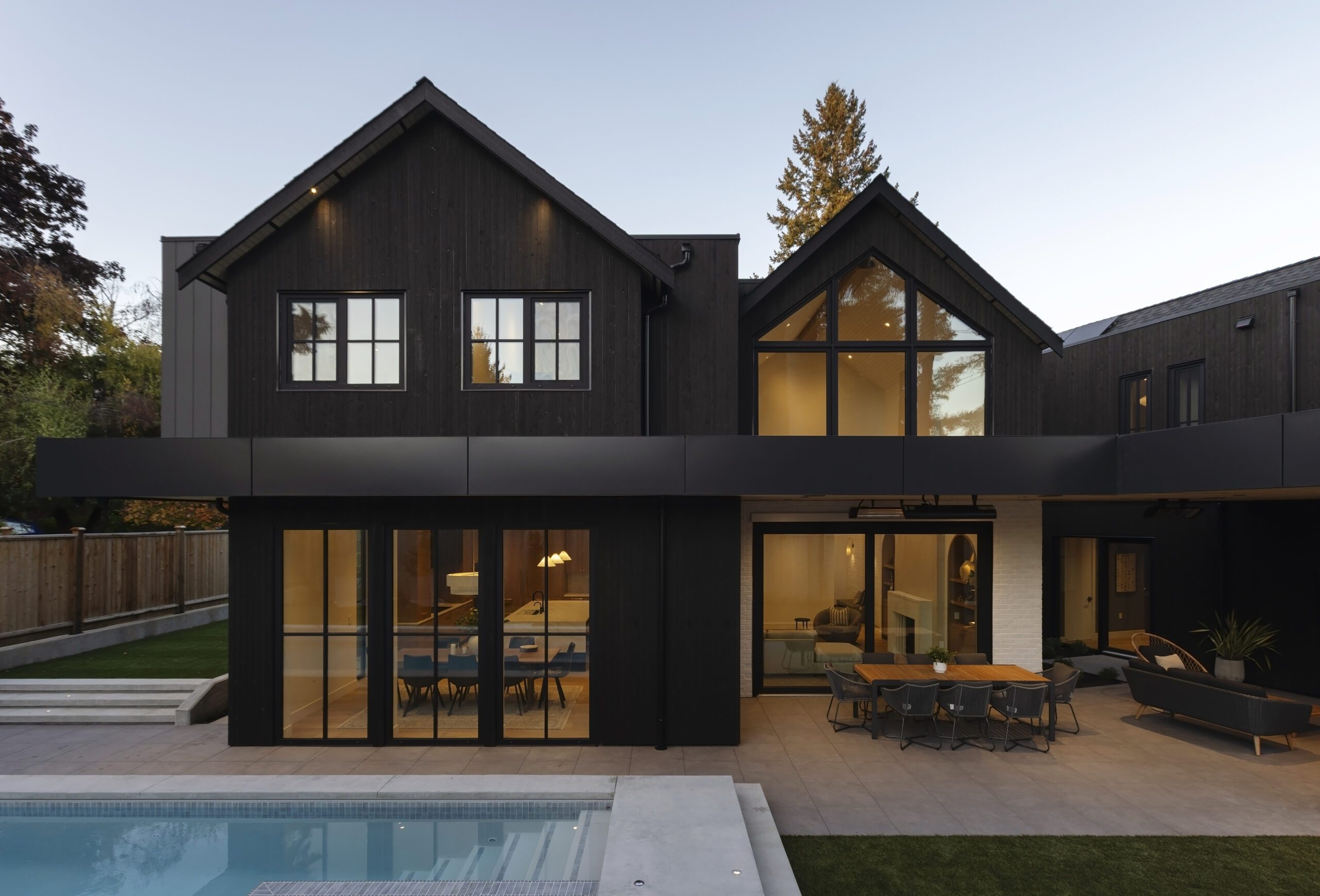 Haven Net Zero house backyard with pool and indoor-outdoor living area