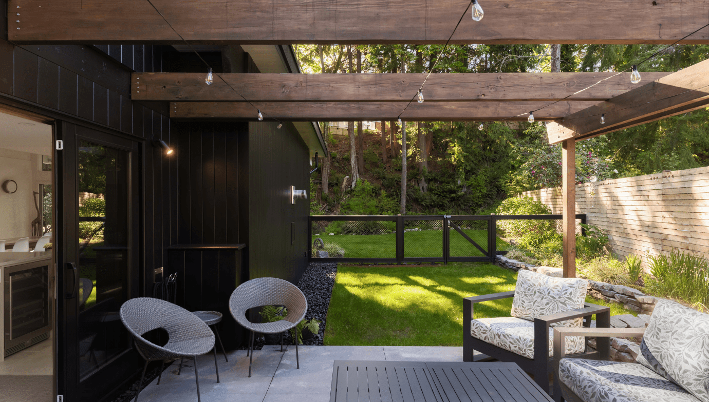 Fenced patio off the kitchen at Pacifica West Coast Modern home renovation