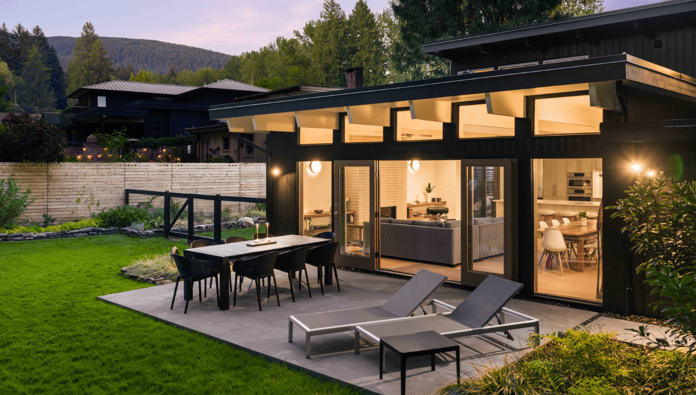 View of Pacifica backyard and patio at dusk