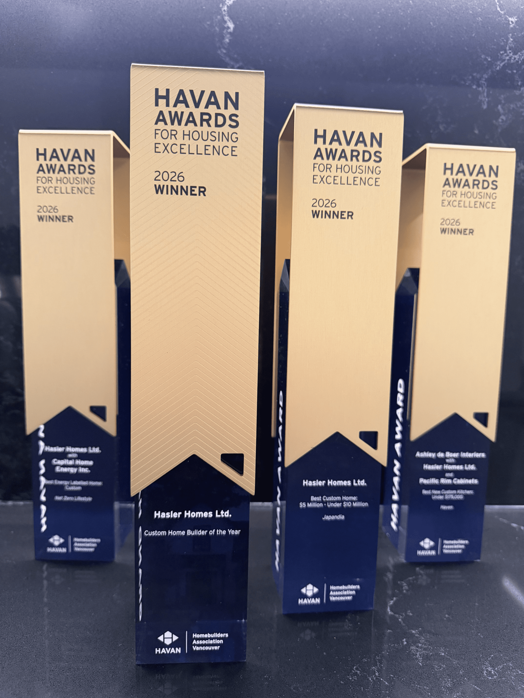 Hasler Homes’ HAVAN Awards trophies including Custom Home Builder of the Year trophy