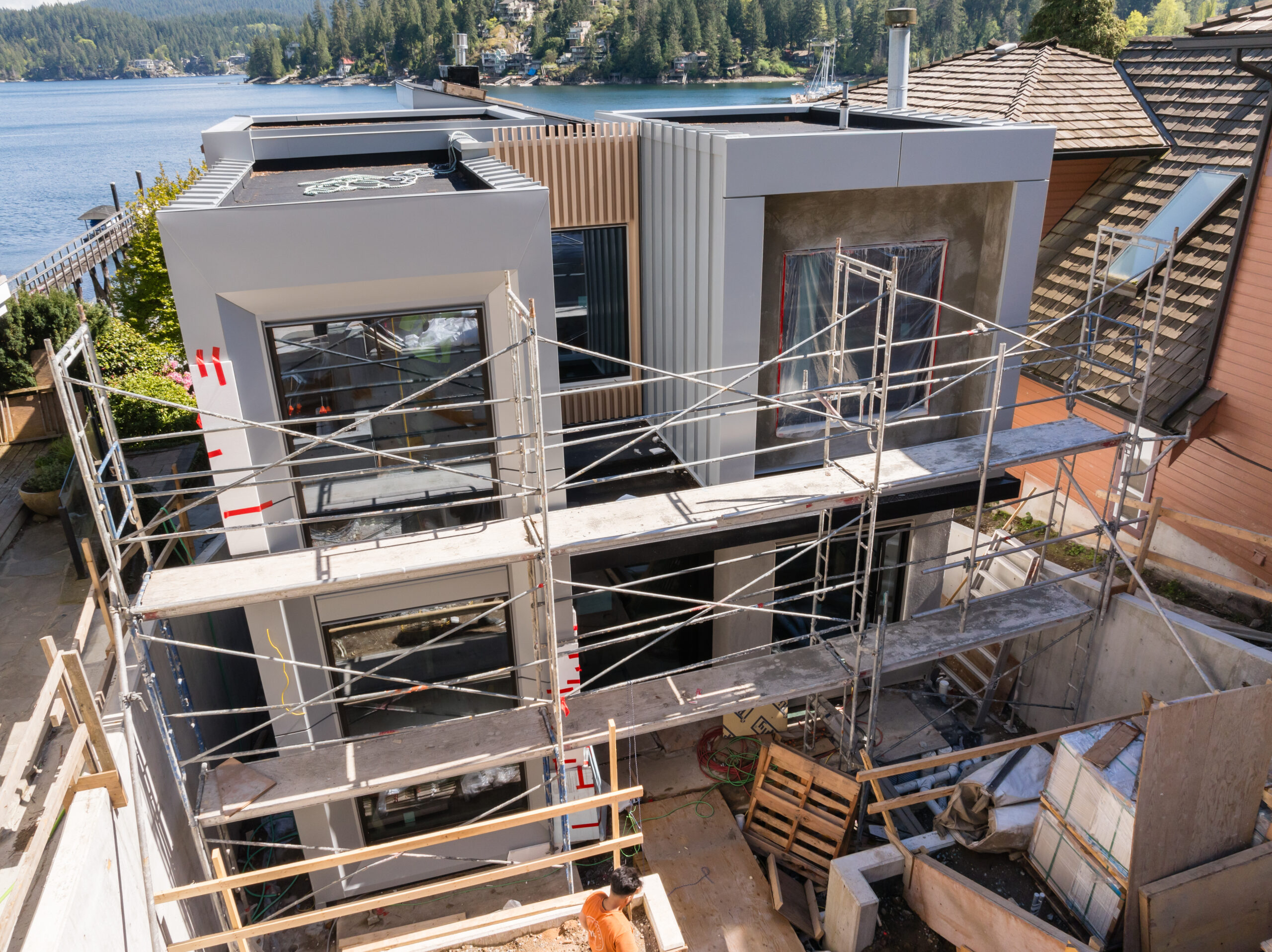Deep Cove waterfront custom home under construction by North Vancouver custom home builder Hasler Homes